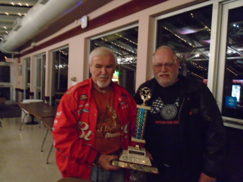 2016 High Mileage winner was Richard Zeleny, with runners-up Tony and Bev Guadagnolo & Dave and Barb Manser. Here, Gates Turpin, (right) who has won the award for several years presents Richard with the trophy. Thanks very much to Gates for having the 2016 information engraved on the trophy, and for doing the presentation.